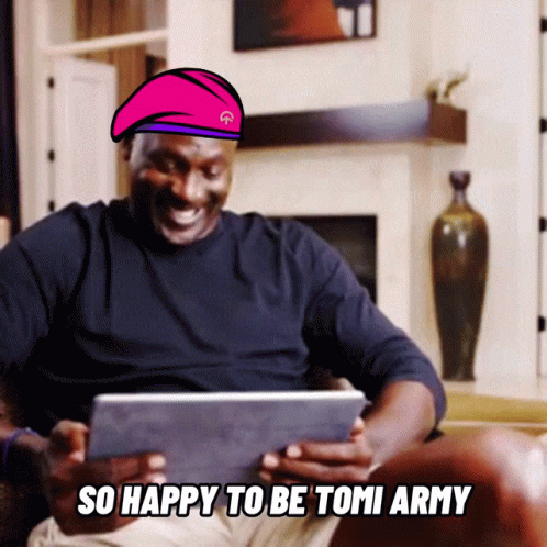 Man In Pink Beret Says So Happy To Be Tomi Army Looking At Tablet GIF