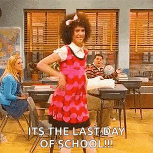 Man in Pink Dress Dancing in Classroom