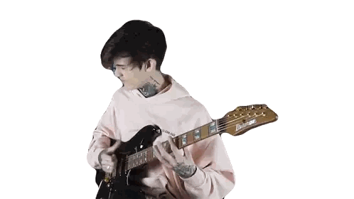 Man in Pink Hoodie Playing Guitar