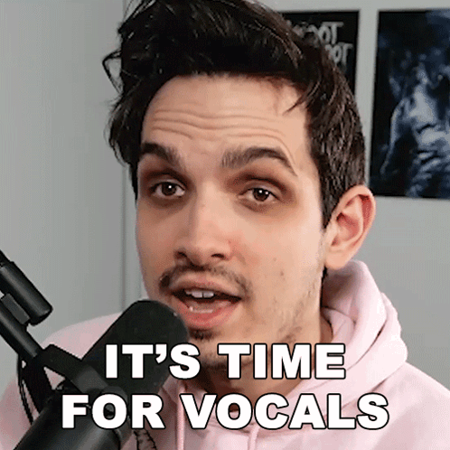 Man in Pink Hoodie Saying It's Time for Vocals