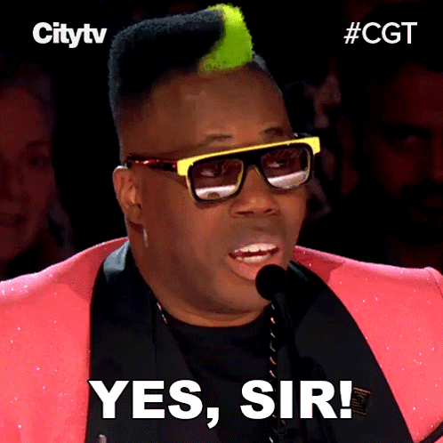 Man in Pink Jacket and Sunglasses Says Yes