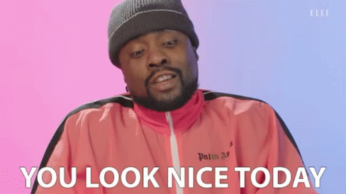 Man in Pink Jacket with Palm Angels Saying You Look Nice Today