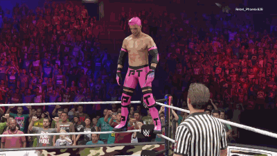Man in Pink Jumping in Wrestling Ring