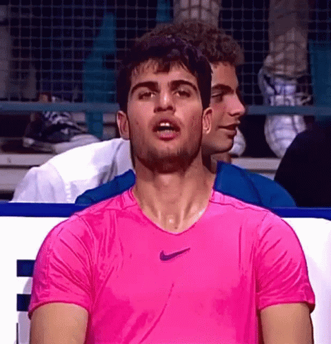 Man In Pink Nike Shirt Sweating GIF