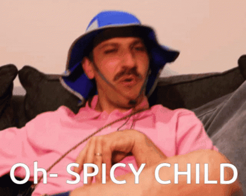 Man in Pink Shirt and Blue Hat Says Oh Spicy Child