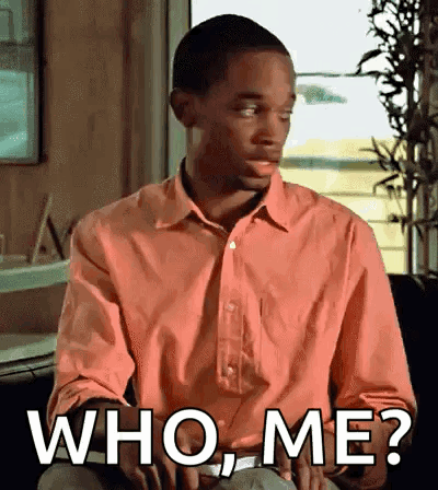Man In Pink Shirt Asking Who Me GIF