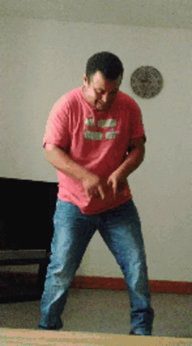 Man in Pink Shirt Dancing