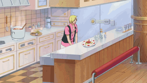 Man in Pink Shirt in Kitchen With Plate