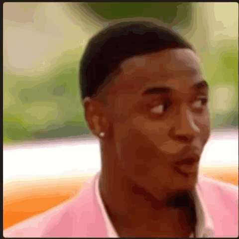 Man In Pink Shirt Making Funny Face GIF