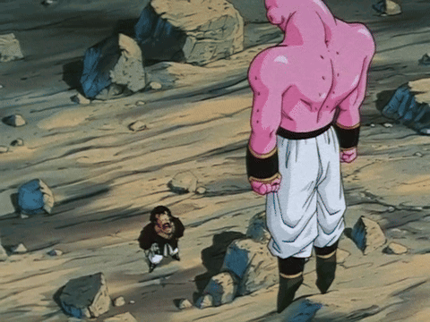 Man In Pink Shirt Next To Smaller Man GIF