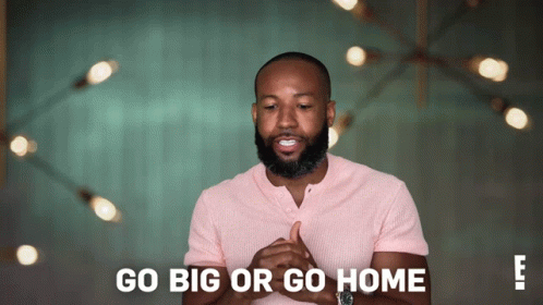 Man In Pink Shirt Saying Go Big Or Go Home GIF