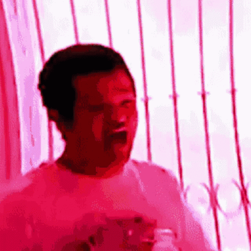 Man in Pink Shirt Standing