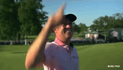 Man in Pink Shirt Waving