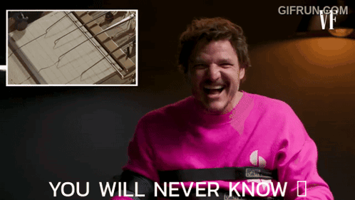 Man in Pink Sweater Laughing You Will Never Know
