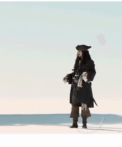 Man in Pirate Costume on Beach