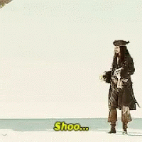 Man in Pirate Costume Saying Shoo