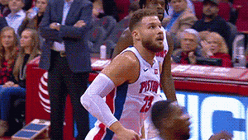 Man In Pistons Jersey Playing Basketball GIF