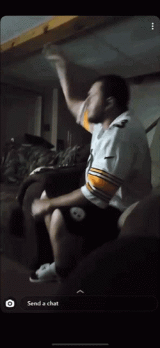 Man In Pittsburgh Steelers Jersey Sitting On Couch GIF