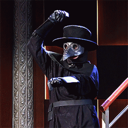 Man In Plague Doctor Costume With Top Hat GIF