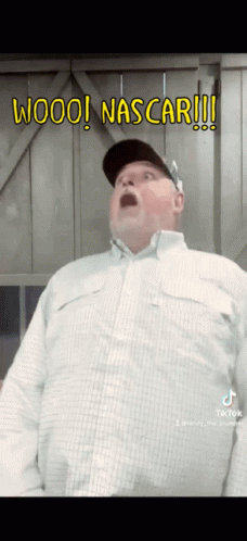Man in Plaid Shirt and Baseball Cap Wooo Nascar