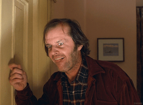 Man in Plaid Shirt and Brown Jacket