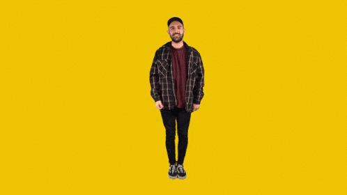 Man in Plaid Shirt and Hat Dancing