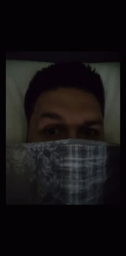 Man In Plaid Shirt Covering Face GIF