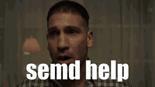 Man in Plaid Shirt Crying Send Help