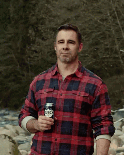 Man in Plaid Shirt Holding Busch Beer and Flipping Off