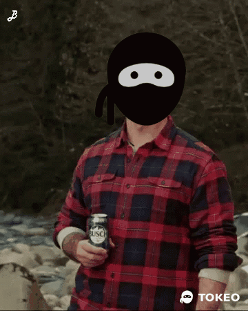 Man in Plaid Shirt Holding Busch Beer