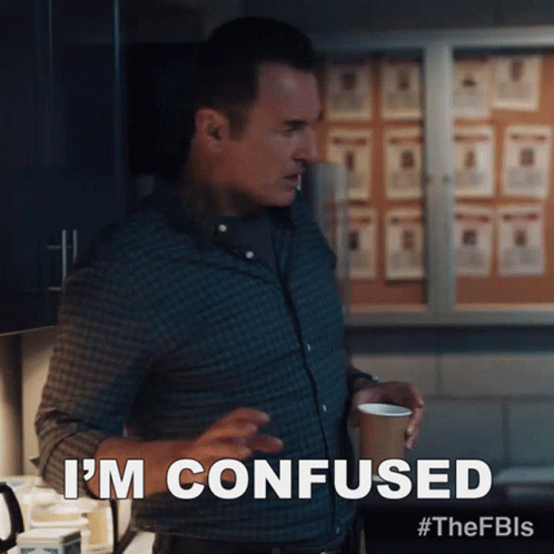 Man In Plaid Shirt Holding Coffee Says I'm Confused GIF