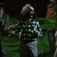 Man in Plaid Shirt in Cemetery
