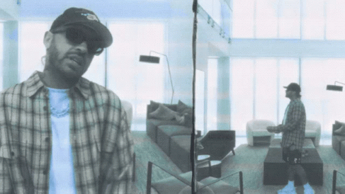 Man in Plaid Shirt in Living Room