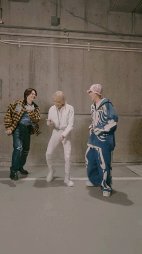 Man In Plaid Shirt Kicking Another Man GIF