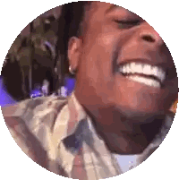 Man in Plaid Shirt Laughing