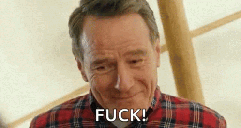 Man in Plaid Shirt Laughing and Saying Fuck