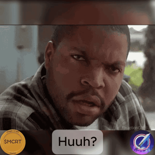Man in Plaid Shirt Looking at Screen Saying Huuh