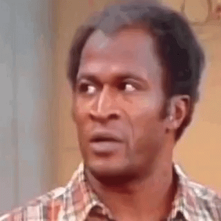 Man In Plaid Shirt Making Funny Face GIF