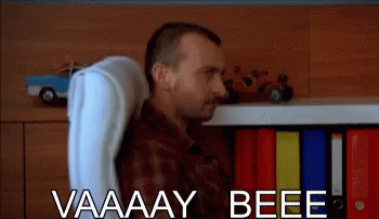 Man In Plaid Shirt Near Water TRT Logo GIF