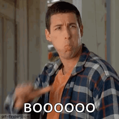 Man in Plaid Shirt Saying Booo