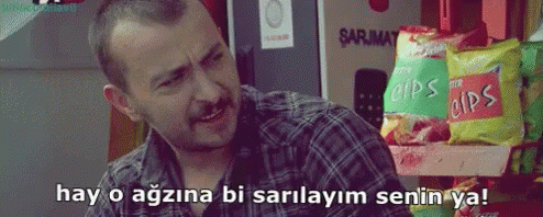 Man In Plaid Shirt Saying Hay O Agzina Bi Sarilayim Senin Ya GIF