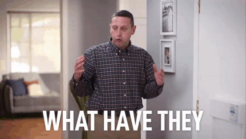 Man in Plaid Shirt Saying What Have They