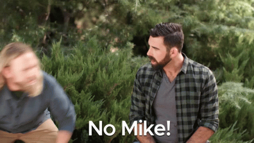 Man in Plaid Shirt Says No Mike