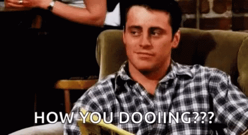 Man In Plaid Shirt Sitting On Couch GIF