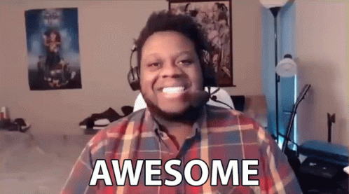 Man In Plaid Shirt Smiling Says Awesome GIF