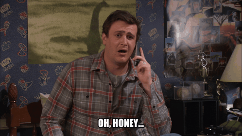 Man In Plaid Shirt Talking On Phone Saying Oh Honey GIF