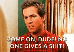 Man In Plaid Shirt Talking To Another GIF