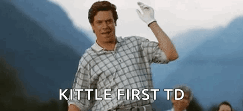 Man in Plaid Shirt Waving Says Kittle First TD