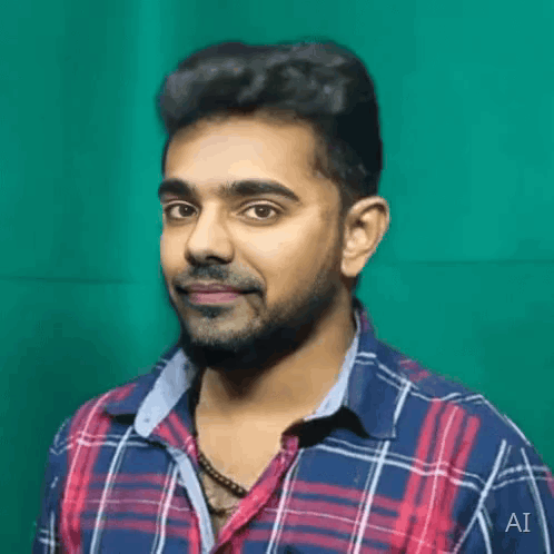 Man in Plaid Shirt With AI on Sleeve