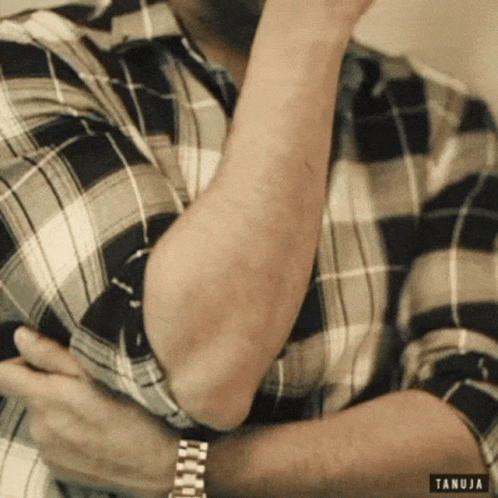 Man in Plaid Shirt with Watch